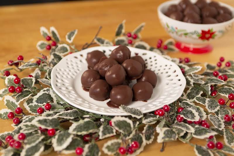 Finished Chocolate Dipped Peanut Butter Balls On Plate