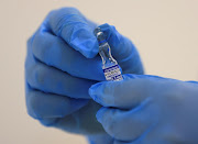 A medical worker holds a vial with Sputnik V (Gam-COVID-Vac) vaccine. The South African Health Products Regulatory Authority (Sahpra) said on Thursday it will carry out due diligence in the approval process for vaccines, and refuses to be pressured into approving those not suitable for use in SA. 