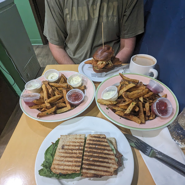 The 2 plates of fries is one large order