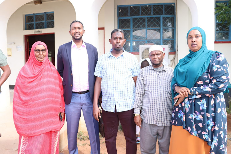 Wajir governor aspirant on a wiper ticket Siyad Abdullahi[2nd L ] poses for a photo with friends and family members after he was cleared by the IEBC on sunday.