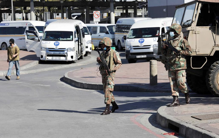 SANDF with police and Cape Town law enforcement patrol the Bellville taxi rank on as schools reopened on Monday following weeks of deadly taxi violence between CATA and CODETA in the Western Cape.