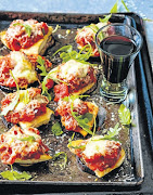 Chicken parmigiana on brinjal slices.