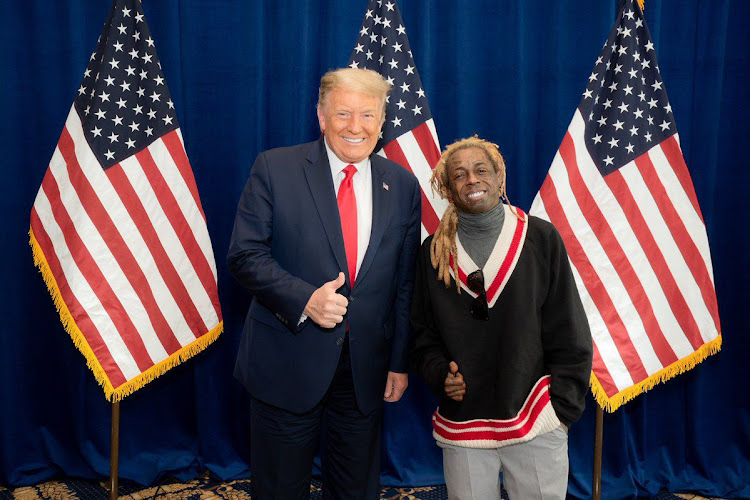 President Donald Trump with rapper Lil Wayne, whose legal name is Dwayne Carter Jr.