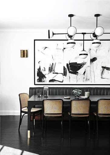 Graphic art combined with this mid-century piece creates the perfect vignette.