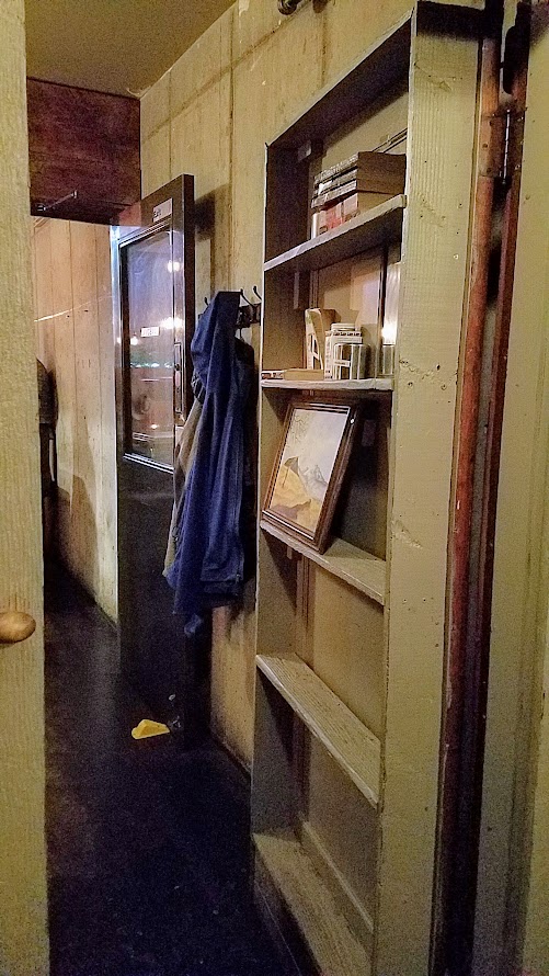 The entrance to LangBaan is behind a bookcase at the back of PaaDee