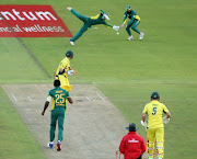 Quinton de Kock of the Proteas drops David Warner of Australia during the Momentum ODI Series 5th ODI match between South Africa and Australia at PPC Newlands on October 12, 2016 in Cape Town.