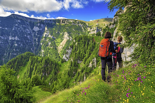 Hikers on a narrow trail in the Bucegi mountains, Romania. The Eastern European country is becoming more popular with adventurous South Africans.