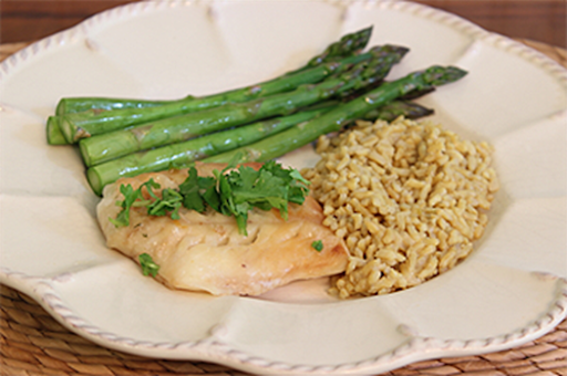 Drunken tilapia with steamed asparagus and rice pilaf