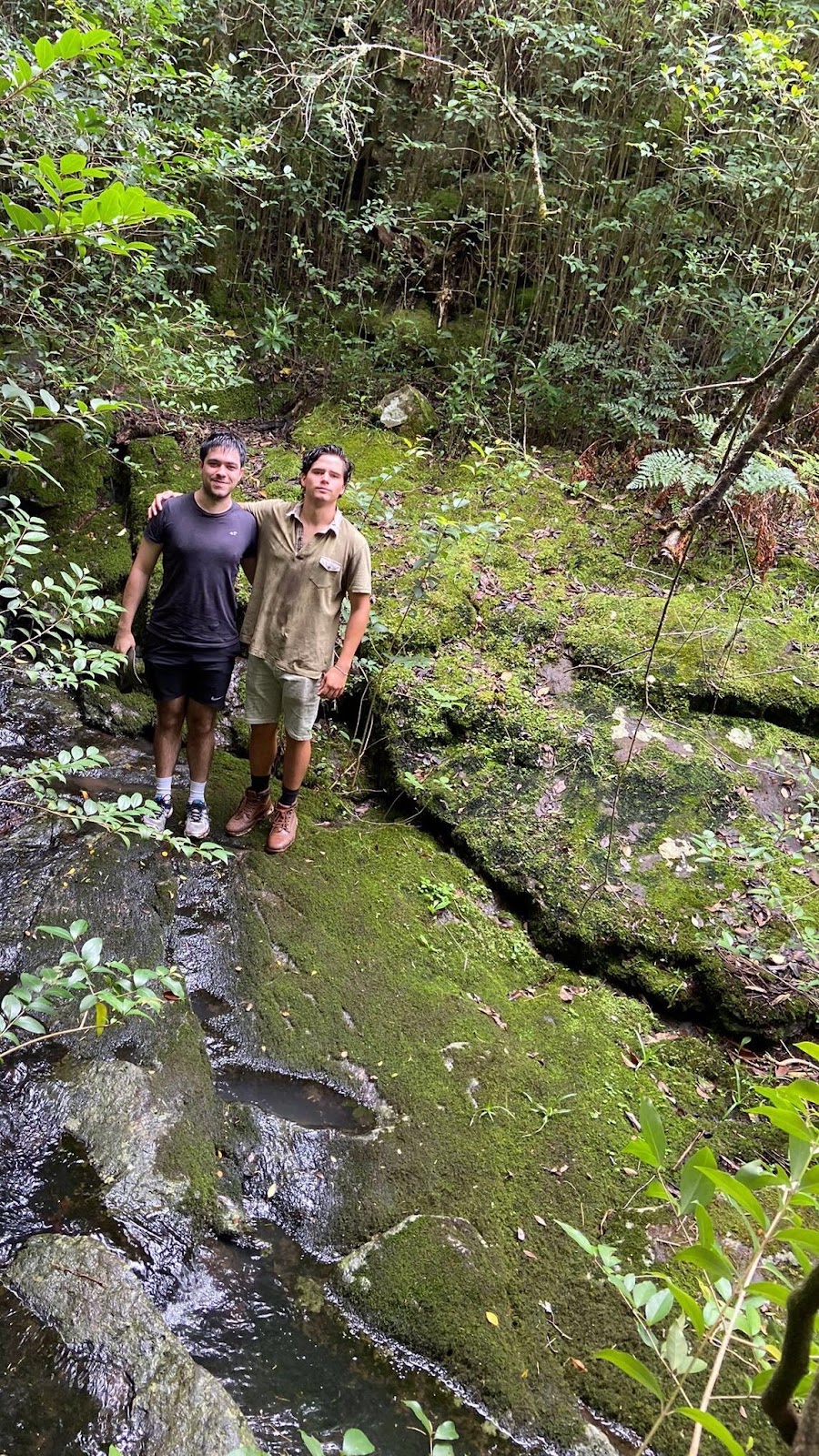 Two guys in the middle of nature.