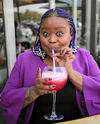 Lesego Tlhabi sips juice at Tashas, just like her alter ego, Coconut Kelz, would.