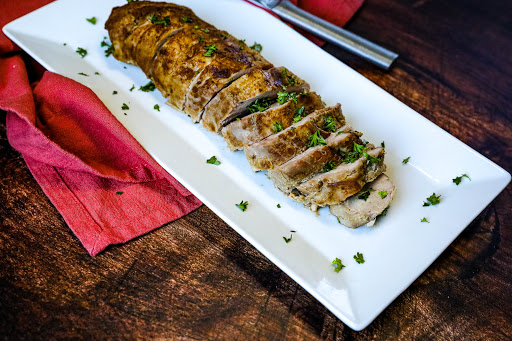 Sliced Asian Pork Loin on a platter.