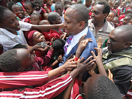 Governor Mike Sonko with students at Our Lady of Mercy School in Starehe on Friday /GPS