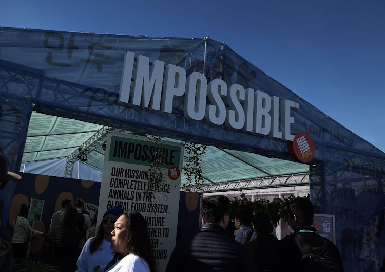 Attendees stand outside the Impossible Foods booth at CES 2020 in Las Vegas, Nevada, the US. Picture: BRIDGET BENNETT/BLOOMBERG