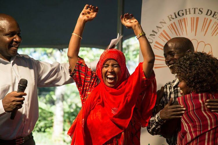 Mama Rahma Wako receives an award at the Embassy of the Netherlands Nairobi in 2017