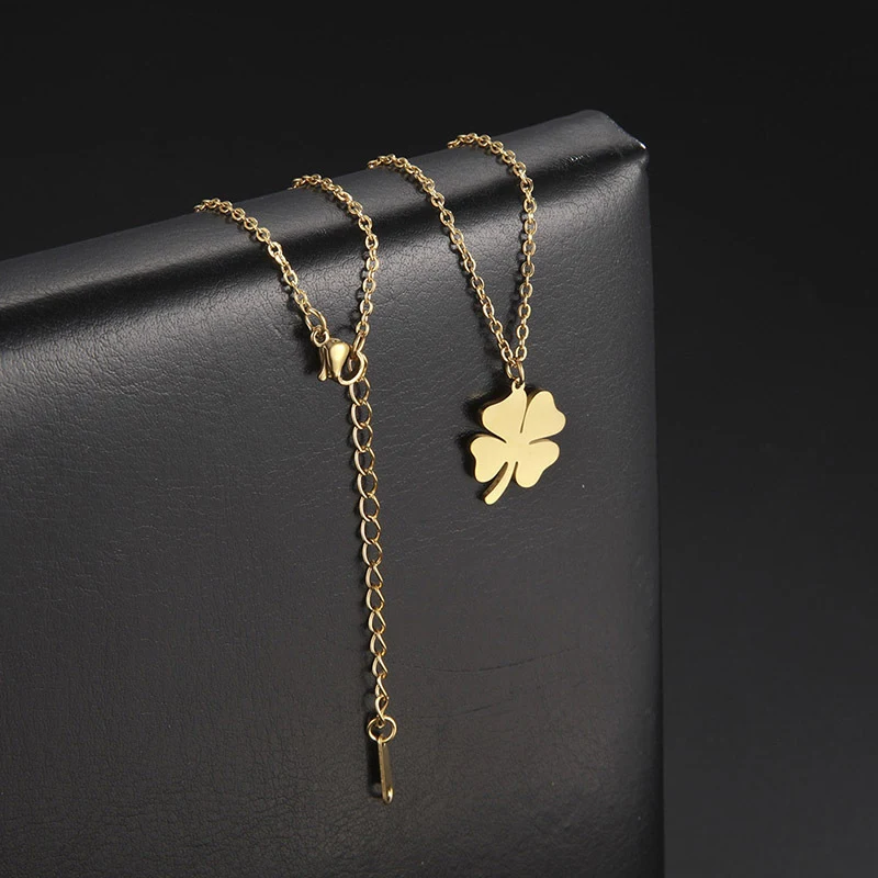 Collier coréen classique pour filles en acier inoxydable, trèfle à quatre feuilles creux porte-bonheur, pendentif feuille sauvage, style tempérament couple.