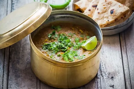 Dal Fry+4 Tawa Butter Roti