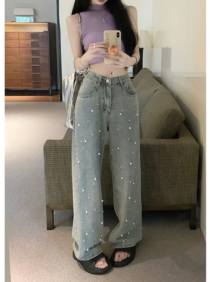 Jeans Donna Estate Nuovo Design Vita Alta Gamba Larga. Pantaloni dritti a gamba larga, perfetti per l'estate, con un design moderno e confortevole.