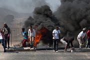 Protesters blocked a portion of Southern Bypass Street in Vredenberg. At the end of the first day of protest on Tuesday, over 30 people were arrested for public violence.