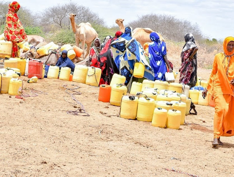 Lafey residents fetch water at a borehole on Tuesday.