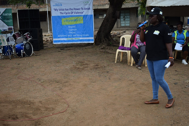 Homa Bay director of gender Evelyn Ododa speaks during their meeting at Shauri Yako estate in Homa Bay town on December 9,2023