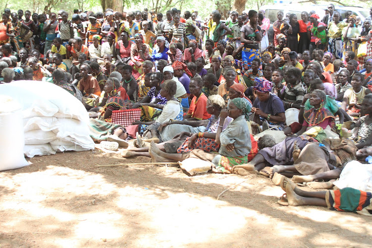 Hundreds of hungry Pokot women turn up for relief food in Nginyang, Tiaty, on March 19