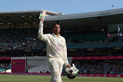 Usman Khawaja of Australia leaves the field at the declaration on day four of the fourth Test in the Ashes series against England at Sydney Cricket Ground on January 8 2022.