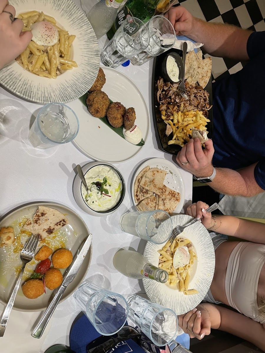 Messy picture, but you can see the carbonara pasta, gyro, pita, tomato fritters, and cheese croquettes.