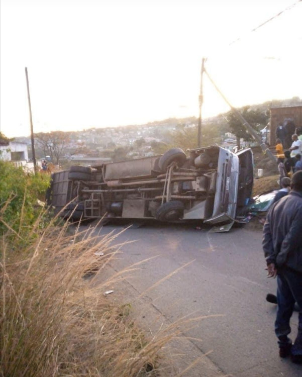 A bus carrying mourners overturned in Waterloo, north of Durban, on Sunday.