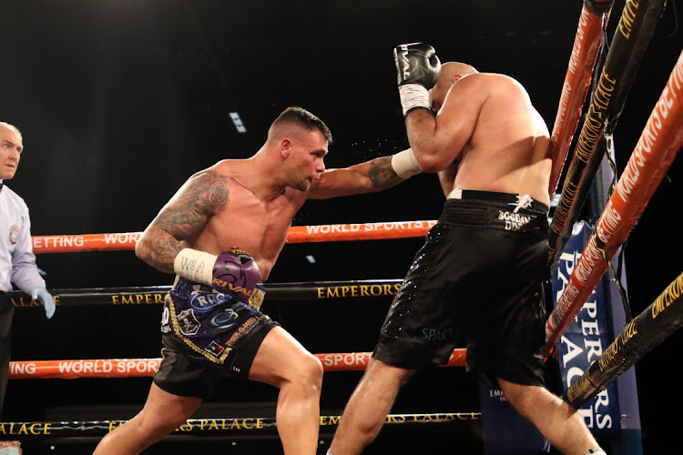 Kevin Lerena sends a straight left punch into Bogdon Dinu during a previous match.