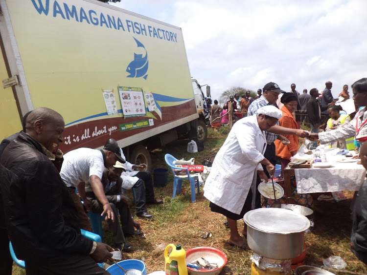 Nyeri county Ffsheries officials demonstrate how to prepare fish during a past farmers’ field exhibition at Wambugu ATC