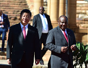 South Africa's President Cyril Ramaphosa and China's President Xi Jinping at the Union Buildings in Pretoria on July 24, 2018. 