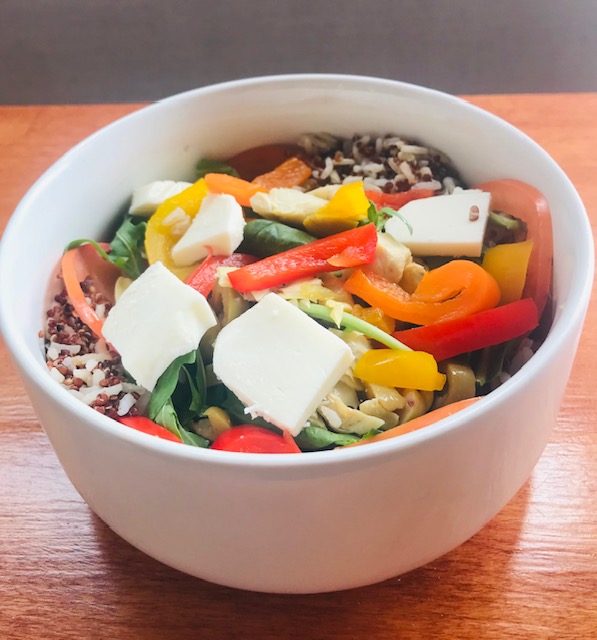 Grain bowl: rice & quinoa over a bed of greens. Your choice of toppings and dressing.