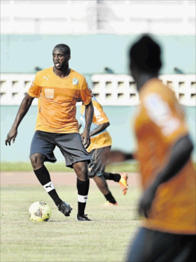 POWERHOUSE: Ivory Coast midfielder Yaya Toure in training for the qualifier against Sierra Leone. PHOTO: ISSOUF SANOGO/AFP