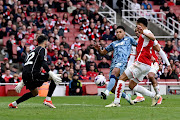 Ollie Watkins scores Aston Villa's second goal in their Premier League win against Arsenal at Emirates Stadium in London on Sunday. 