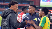 Rivaldo Coetzee, formerly with Ajax Cape Town, sharing a light moment with his now teammates at Mamelodi Sundowns Themba Zwane and Percy Tau. 