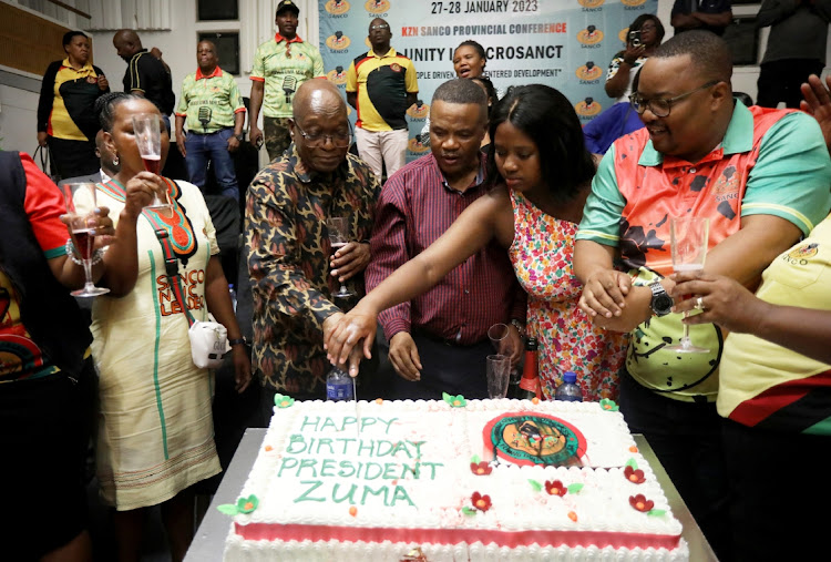 Former president Jacob Zuma cuts a cake during his birthday celebrations at Durban Music House on April 12.