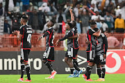 Orlando Pirates players celebrate their Nedbank Cup quarterfinal win against AmaZulu at Moses Mabhida Stadium on Saturday.