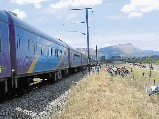 Commuters leave the train in search of alternative transport due to long delays. PICTURE: SUPPLIED