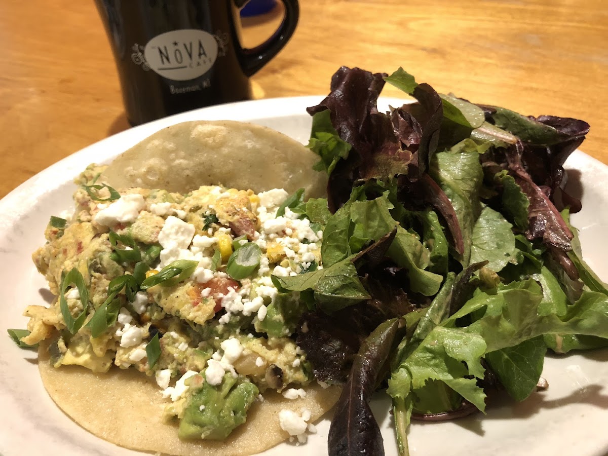 Scramble special made into tacos with greens.