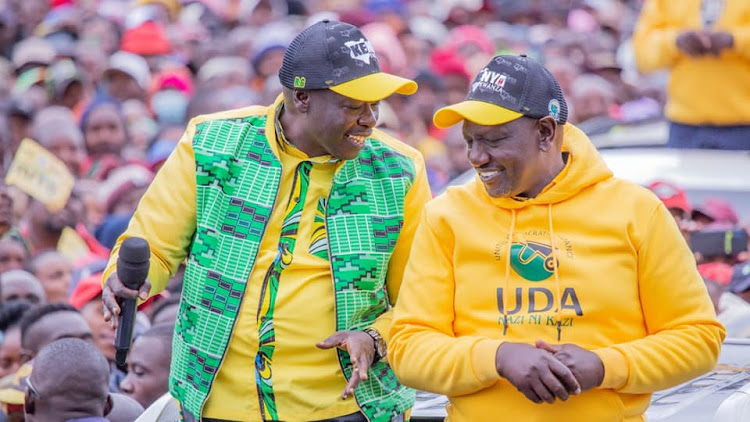 Running mate Rigathi Gachagua and presidential candidate DP Ruto during a campaign rally inat Kagio in Kirinyaga on August 3.