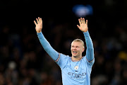 Erling Haaland of Manchester City celebrates after the team's victory in the UEFA Champions League quarterfinal first leg match between Manchester City and FC Bayern München at Etihad Stadium on April 11, 2023 in Manchester, England.