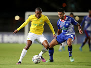 Mamelodi Sundowns  defender Thapelo Morena challenged by Keegan Ritchie of Maritzburg United during the DStv Premiership match at Harry Gwala Stadium in Petermaritzburg on Saturday.