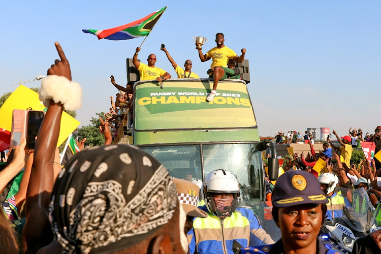 South Africans from all walks of life celebrate the Springboks’ Rugby World Cup triumph during the team’s victory parade in an open top bus in Soweto last week.