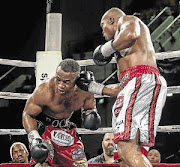 Ilunga 'Junior' Makabu punishes Thabiso 'The Rock' Mchunu en route to knocking him out in the 11th round of their WBC cruiserweight title eliminator.