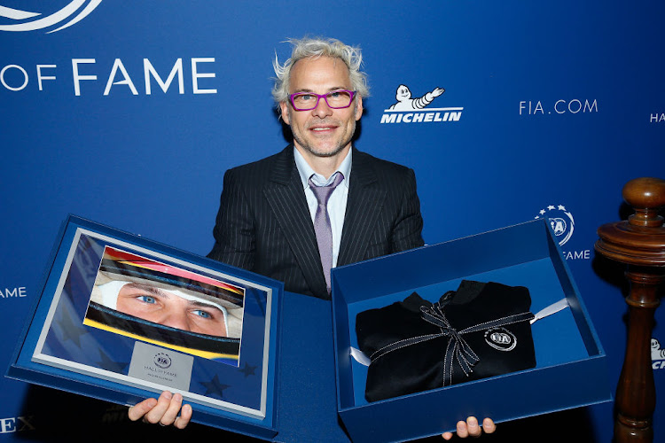 1997 Formula 1 World Champion Jacques Villeneuve is pictured after being awarded during the FIA Hall of Fame Induction ceremony at Automobile Club De France on December 4, 2017 in Paris, France.