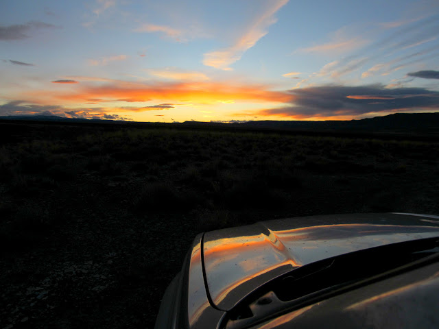 Sunset reflected on the Jeep's hood