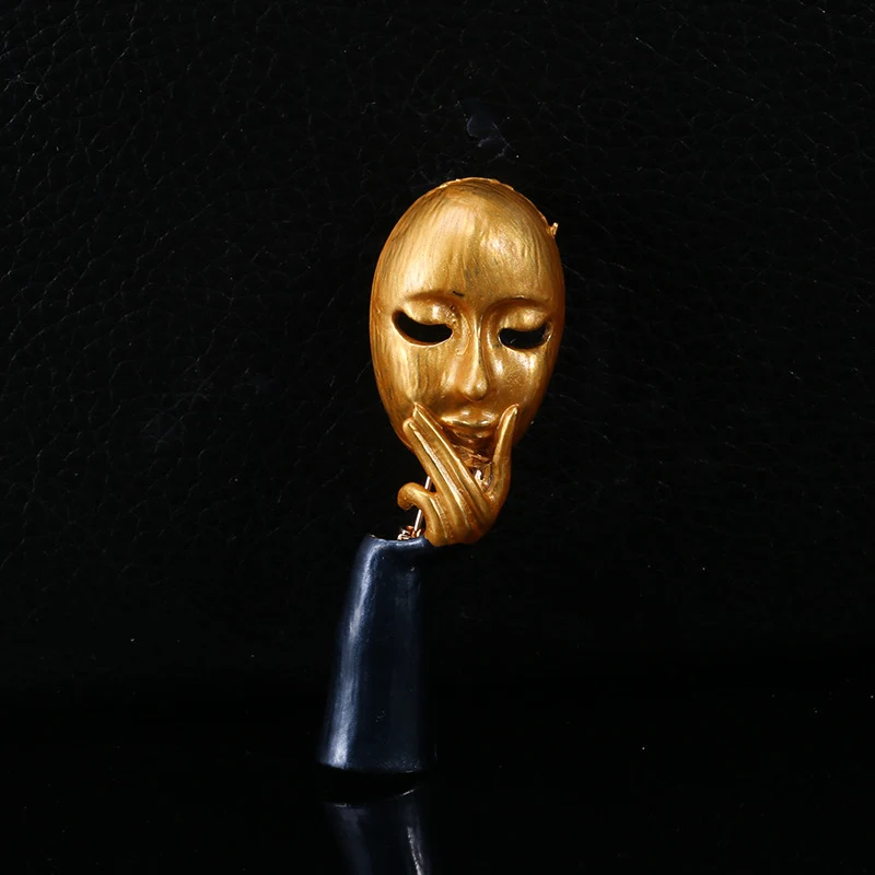 Gezichtsmasker Denker Emaille Olie Druppel Broche. Een unieke accessoire voor reflectie en stijl. Voegt een vleugje originaliteit toe.