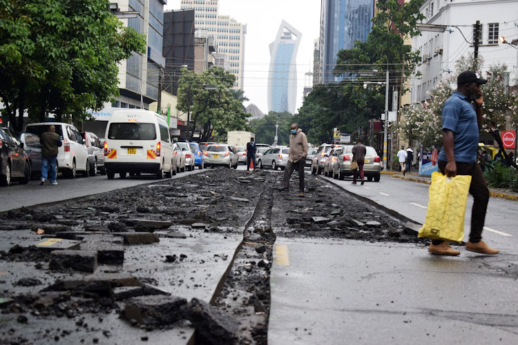 A section of Muindi Mbingu street undergoes reconstruction work by the Nairobi Metropolitan Service in a program to improve the Nairobi CBD. Nairobi Governor Mike Sonko allocated the Nairobi Metropolitan Service (NMS) Sh3.5 billion to aid its operations. June 15, 2020.