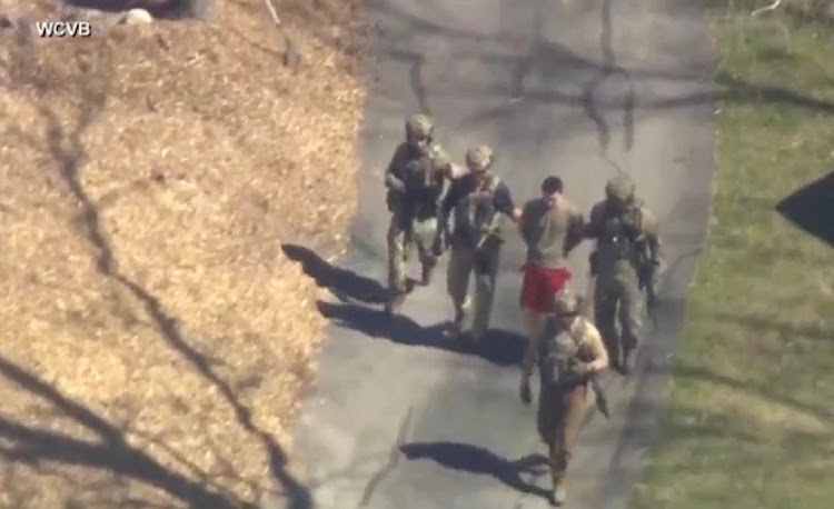 FBI agents arrest Jack Teixeira in connection with an investigation into the leaks online of classified US documents, in North Dighton, Massachusetts, the US, April 13 2023. Picture: WCVB-TV/ABC/REUTERS