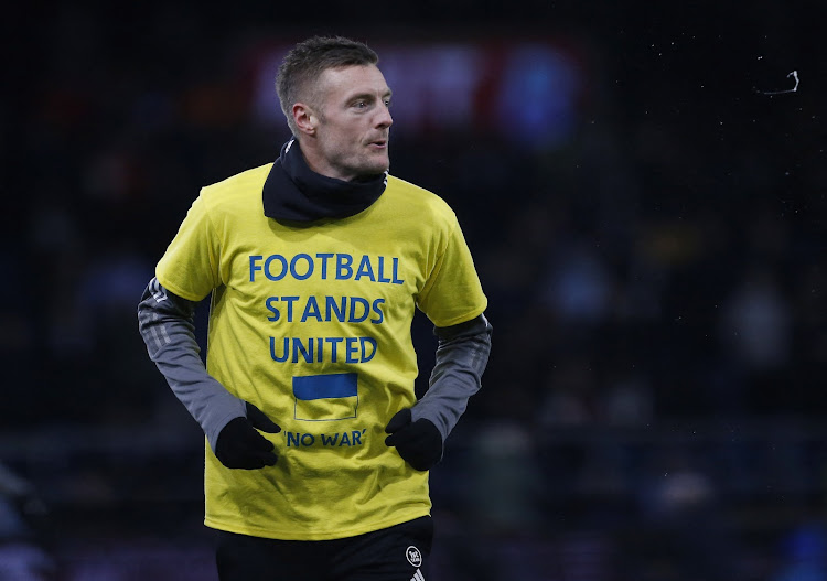 Leicester City's Jamie Vardy wears a shirt in support of Ukraine during warm up